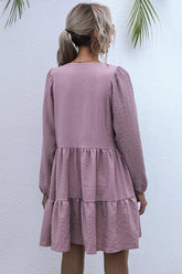 Robe à col noué et ourlet à volants